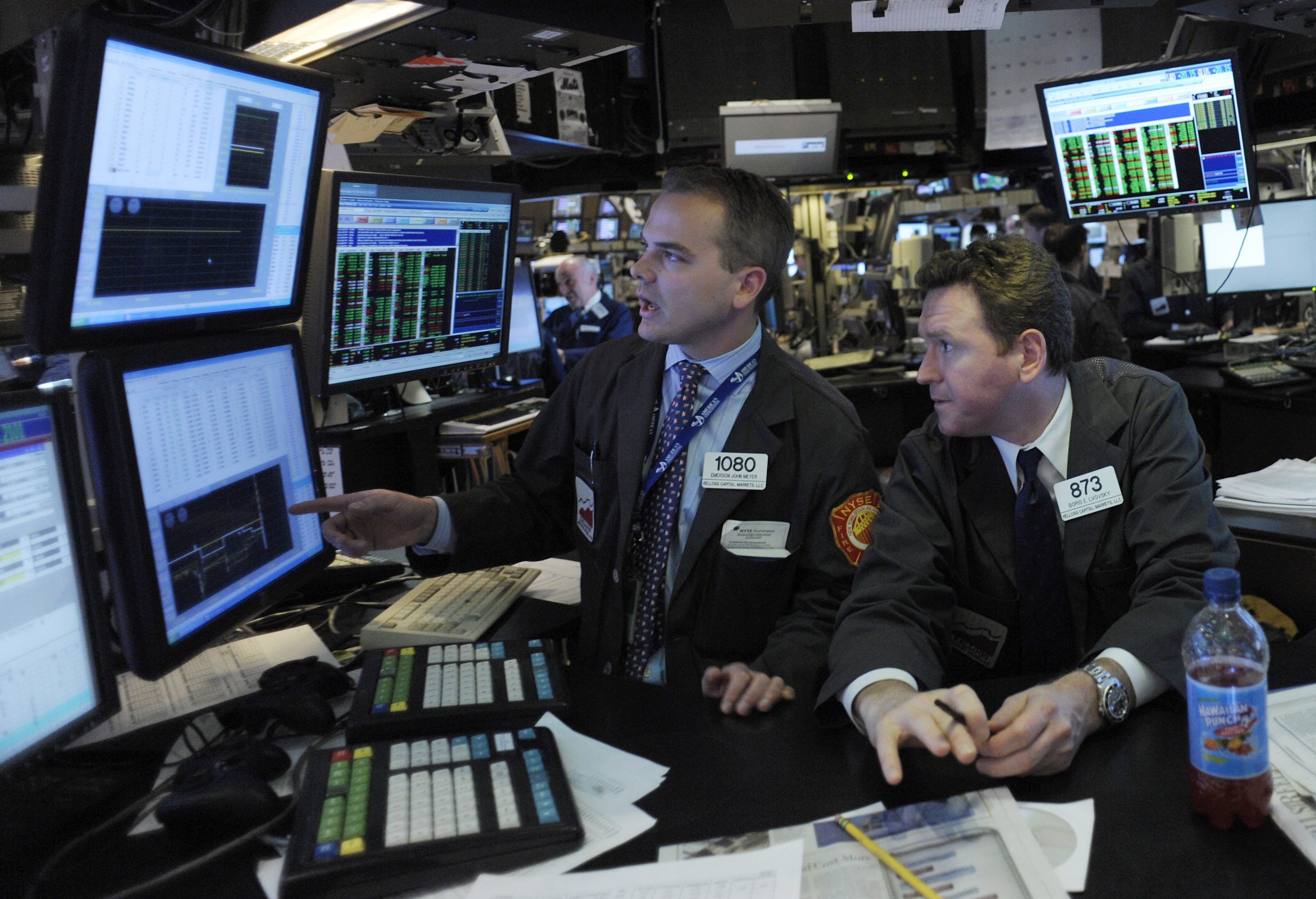 Traders work on the floor at the New York Stock Exchange.
