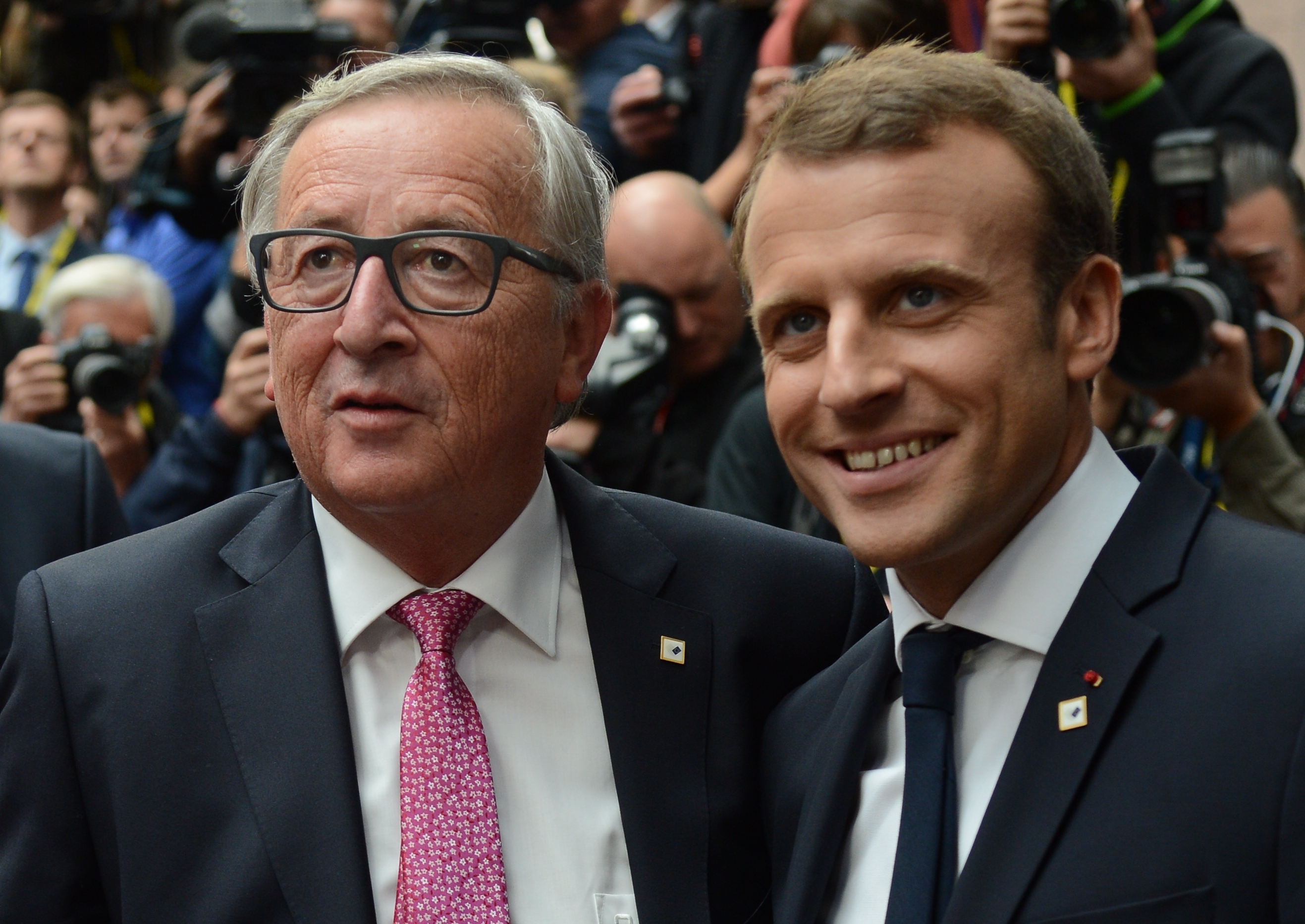 Jean-Claude Juncker, President of the European Commission, left, and French President Emmanuel Macron before a Council of Europe meeting in Brussels.