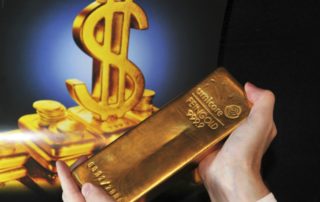 dpa18783117_goldbarren_dollar