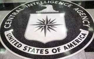 FILE PHOTO: The logo of the U.S. Central Intelligence Agency is shown in the lobby of the CIA headquarters in Langley.