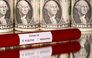 dpa216882482_corona_covid_19_dollar_usa_test