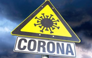 dpa222867725_corona_hotspod_warnschild