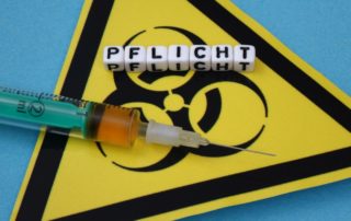 dpa218939351_impfpflicht_impfung_corona_spritze